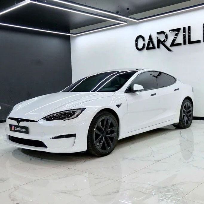 Used Tesla Model S Plaid I Facelift 2, 2024 in Dubai by Carzilla Motors, White color. GCC Specs | AUTO.AE