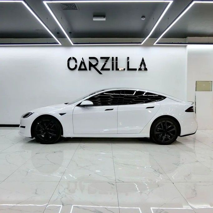 Used Tesla Model S Plaid I Facelift 2, 2024 in Dubai by Carzilla Motors, White color. GCC Specs | AUTO.AE