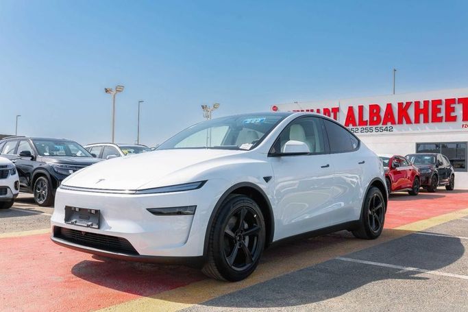 New Tesla Model Y Long Range I Facelift, 2025 in Dubai by Albakheet Motors, White color. Chinese Specs | AUTO.AE