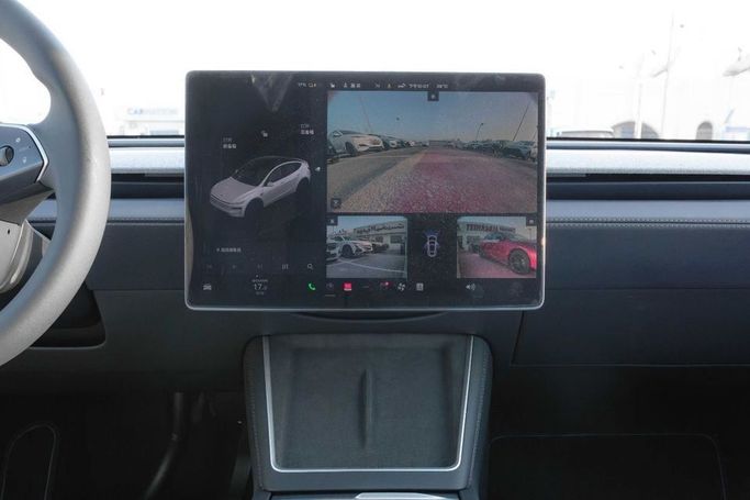 New Tesla Model Y Long Range I Facelift, 2025 in Dubai by Albakheet Motors, White color. Chinese Specs | AUTO.AE