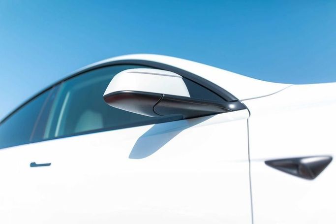 New Tesla Model Y Long Range I Facelift, 2025 in Dubai by Albakheet Motors, White color. Chinese Specs | AUTO.AE