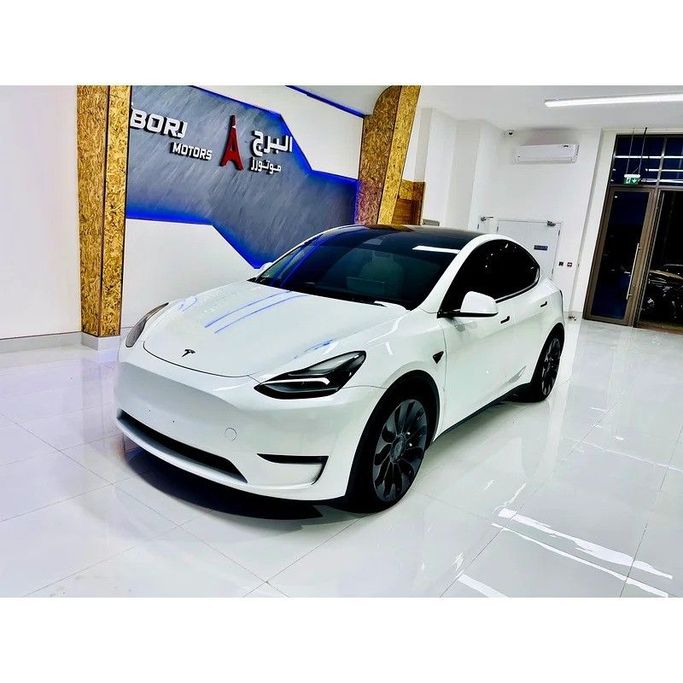 Подержанный Tesla Model Y Performance I, 2024 в Дубае от Al Borj Motors Белый цвет. GCC | AUTO.AE