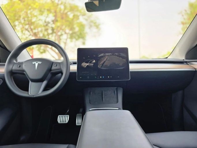 Used Tesla Model Y Performance I, 2024 in Dubai by US Motors, White color. GCC Specs | AUTO.AE
