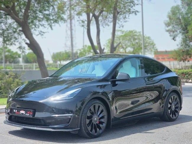 Used Tesla Model Y Performance I, 2023 in Dubai by US Motors, Black color. GCC Specs | AUTO.AE