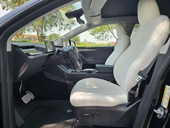 Used Tesla Model Y Performance I, 2023 in Dubai by US Motors, Black color. GCC Specs | AUTO.AE