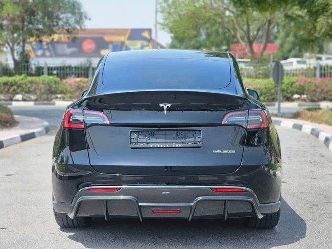 Used Tesla Model Y Performance I, 2023 in Dubai by US Motors, Black color. GCC Specs | AUTO.AE