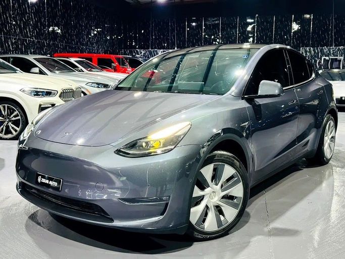 Used Tesla Model Y Long Range I, 2022 in Dubai by Zeus Motors, Grey color. GCC Specs | AUTO.AE
