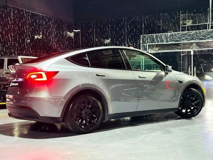 Used Tesla Model Y Performance I, 2024 in Dubai by Zeus Motors, Grey color. GCC Specs | AUTO.AE