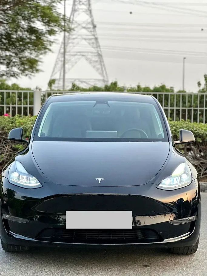 Used Tesla Model Y Long Range I, 2023 in Dubai by Verified Hub Used Automobile Trading LLC, Black color. GCC Specs | AUTO.AE