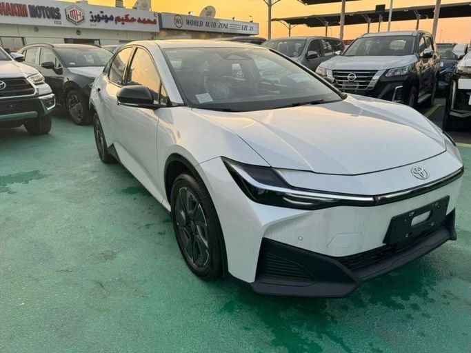 New Toyota bZ3, 2024 in Dubai by Mohamed Hakim Motors, White color. Chinese Specs | AUTO.AE
