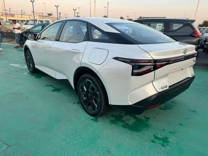 New Toyota bZ3, 2024 in Dubai by Mohamed Hakim Motors, White color. Chinese Specs | AUTO.AE