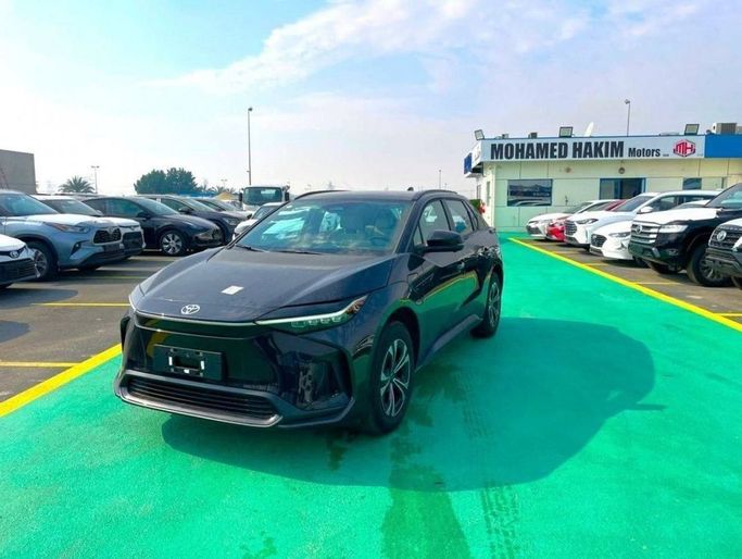 New Toyota bZ4X I, 2023 in Dubai by Mohamed Hakim Motors, Black color. Other | AUTO.AE