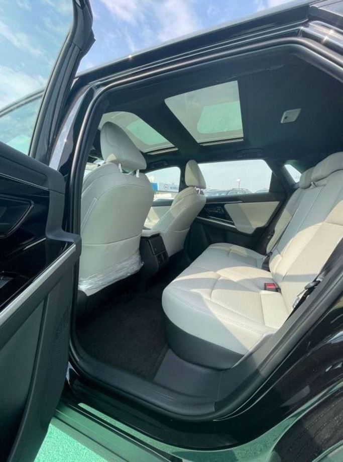 New Toyota bZ4X I, 2023 in Dubai by Mohamed Hakim Motors, Black color. Other | AUTO.AE