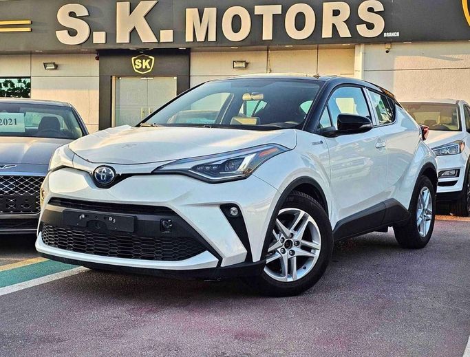 New Toyota C-HR II, 1.8 l, 2023 in Dubai by SK Motors, White color. GCC Specs | AUTO.AE