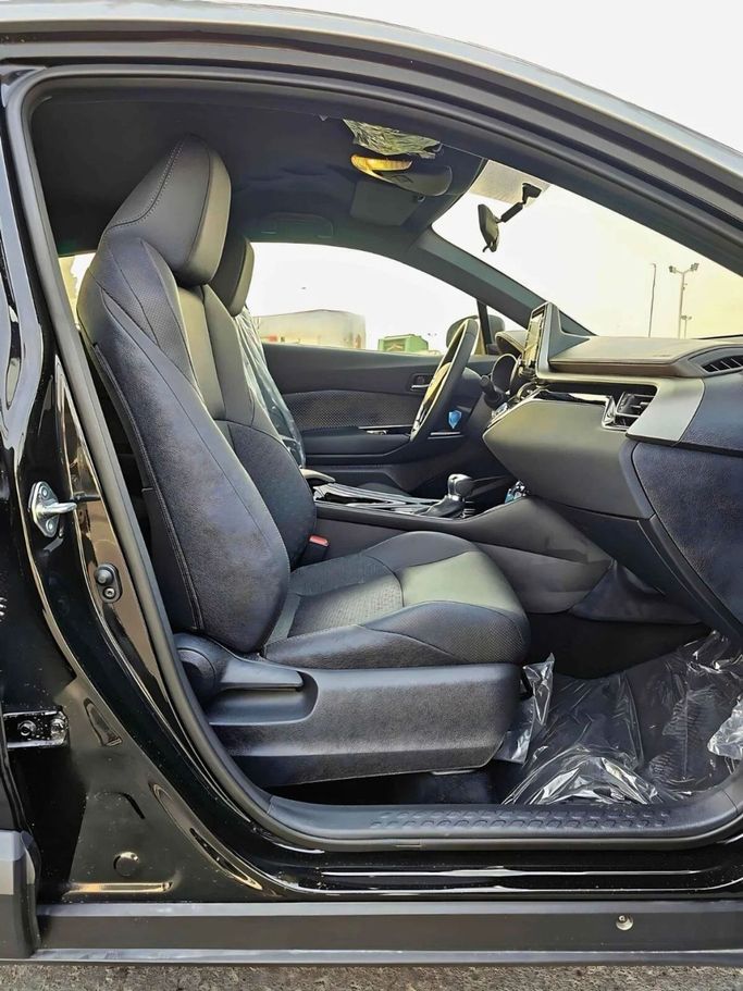 New Toyota C-HR II, 1.8 l, 2023 in Dubai by SK Motors, Black color. GCC Specs | AUTO.AE