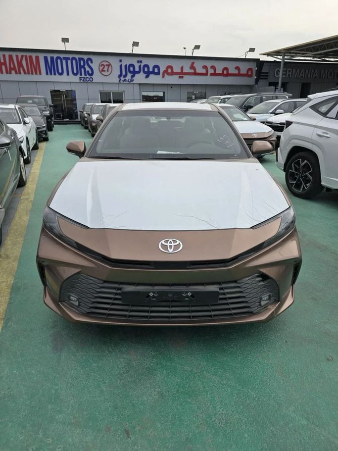 New Toyota Camry IX (XV80), 2.5 l, 2025 in Dubai by Mohamed Hakim Motors, Bronze color. GCC Specs | AUTO.AE