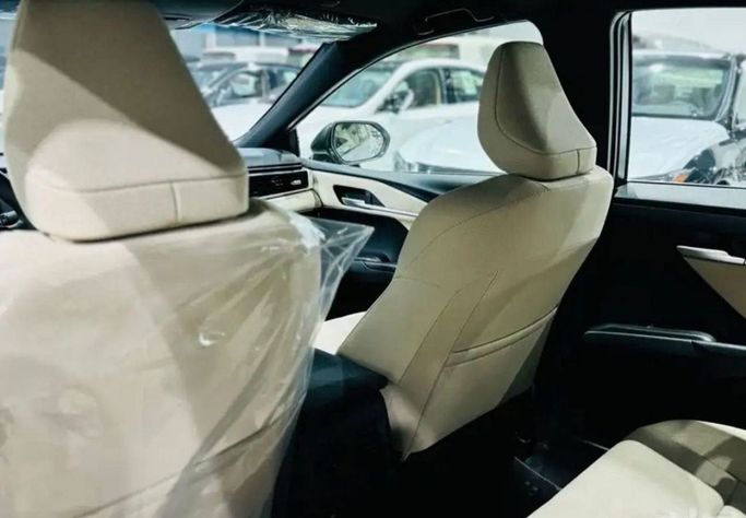 New Toyota Camry IX (XV80) China Market, 2.5 l, 2024 in Dubai by Mohamed Hakim Motors, Grey color. GCC Specs | AUTO.AE