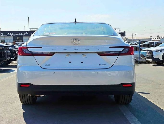 New Toyota Camry IX (XV80), 2.5 l, 2025 in Dubai by SK Motors, White color. GCC Specs | AUTO.AE