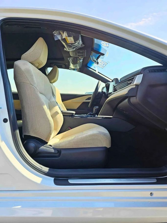 New Toyota Camry IX (XV80), 2.5 l, 2025 in Dubai by SK Motors, White color. GCC Specs | AUTO.AE