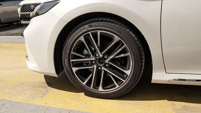 New Toyota Camry IX (XV80), 2.5 l, 2025 in Dubai by Najem Motors, White color. GCC Specs | AUTO.AE