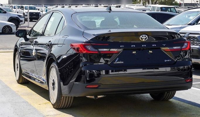 New Toyota Camry IX (XV80), 2.5 l, 2025 in Dubai by Najem Motors, Black color. GCC Specs | AUTO.AE