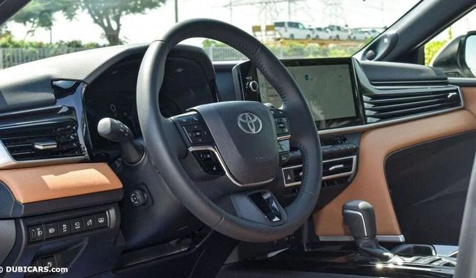 New Toyota Camry IX (XV80), 2.5 l, 2025 in Dubai by Najem Motors, White color. GCC Specs | AUTO.AE