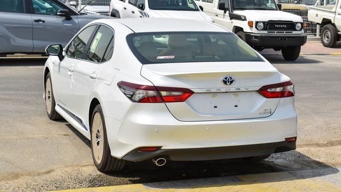 New Toyota Camry IX (XV80), 2.5 l, 2024 in Dubai by Najem Motors, White color. GCC Specs | AUTO.AE
