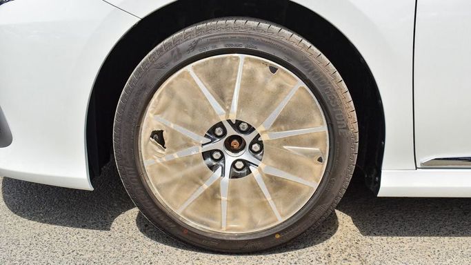 New Toyota Camry IX (XV80), 2.5 l, 2024 in Dubai by Najem Motors, White color. GCC Specs | AUTO.AE