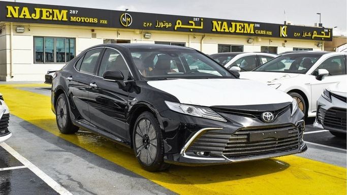New Toyota Camry IX (XV80), 2.5 l, 2024 in Dubai by Najem Motors, Black color. GCC Specs | AUTO.AE