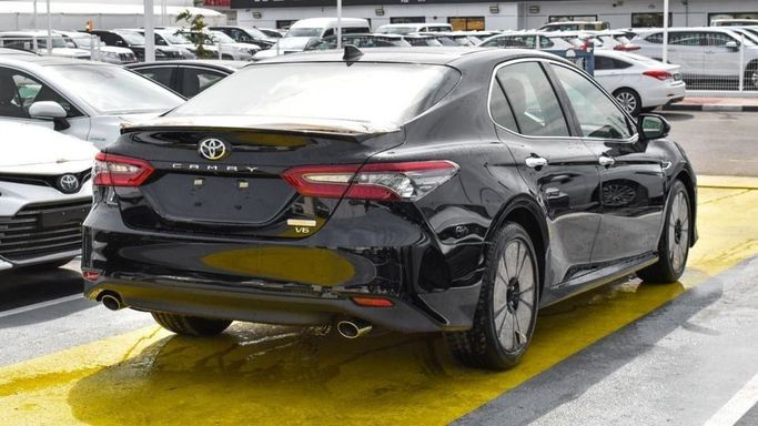New Toyota Camry IX (XV80), 2.5 l, 2024 in Dubai by Najem Motors, Black color. GCC Specs | AUTO.AE