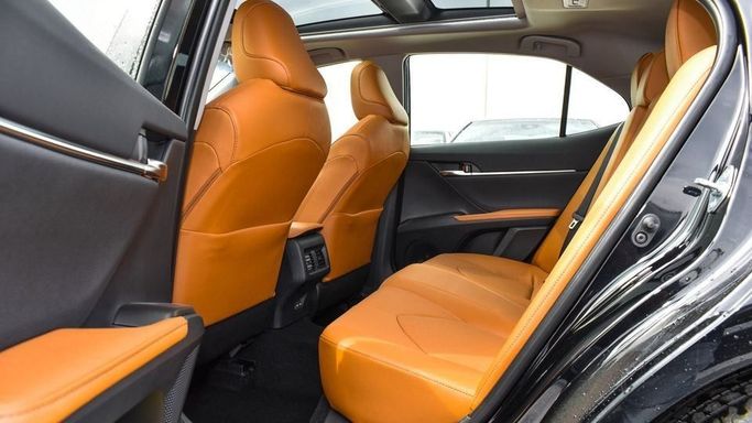 New Toyota Camry IX (XV80), 2.5 l, 2024 in Dubai by Najem Motors, Black color. GCC Specs | AUTO.AE