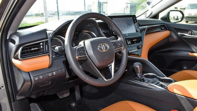 New Toyota Camry IX (XV80), 2.5 l, 2024 in Dubai by Najem Motors, Silver color. GCC Specs | AUTO.AE