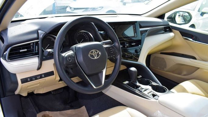 New Toyota Camry VIII (XV70) Facelift, 2.5 l, 2023 in Dubai by Najem Motors, White color. GCC Specs | AUTO.AE