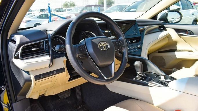 Новый Toyota Camry VIII (XV70) Рестайлинг, 2.5 л, 2023 в Дубае от Najem Motors Черный цвет. GCC | AUTO.AE