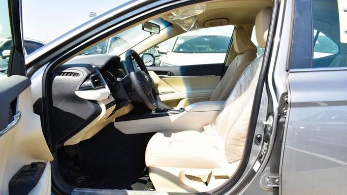 New Toyota Camry VIII (XV70) Facelift, 2.5 l, 2023 in Dubai by Najem Motors, Grey color. GCC Specs | AUTO.AE