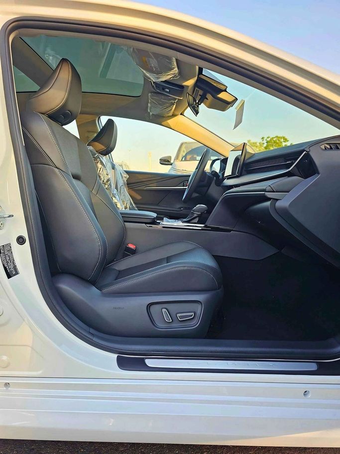 New Toyota Camry IX (XV80), 2.5 l, 2025 in Dubai by SK Motors, White color. Chinese Specs | AUTO.AE