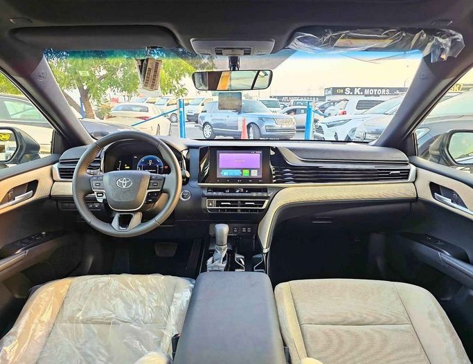 New Toyota Camry IX (XV80), 2.5 l, 2025 in Dubai by SK Motors, Grey color. GCC Specs | AUTO.AE