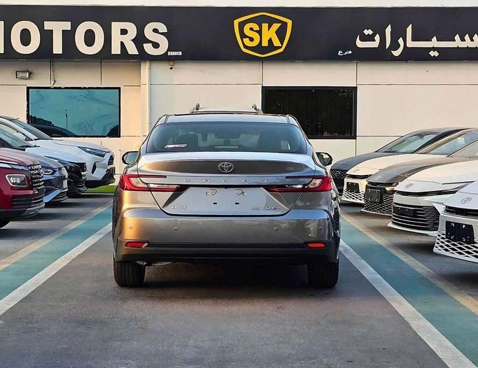 New Toyota Camry IX (XV80), 2.5 l, 2025 in Dubai by SK Motors, Grey color. GCC Specs | AUTO.AE