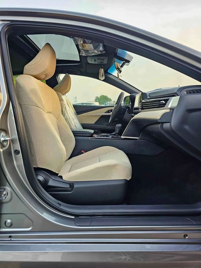 New Toyota Camry IX (XV80), 2.5 l, 2025 in Dubai by SK Motors, Grey color. GCC Specs | AUTO.AE
