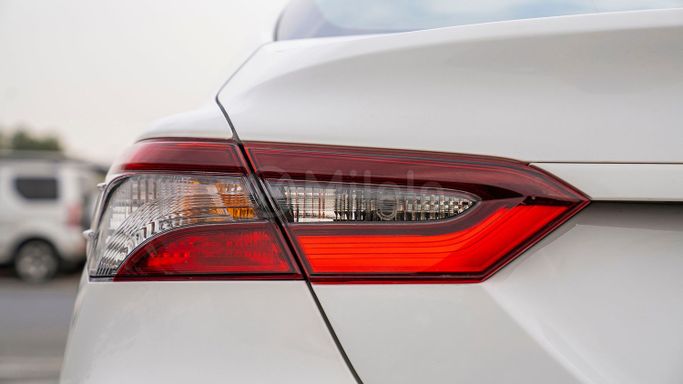 Used Toyota Camry IX (XV80), 2.5 l, 2024 in Dubai by Milele, White color. Other | AUTO.AE