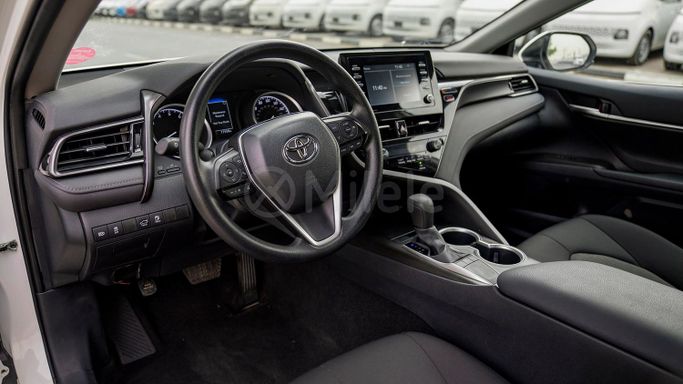 Used Toyota Camry IX (XV80), 2.5 l, 2024 in Dubai by Milele, White color. Other | AUTO.AE