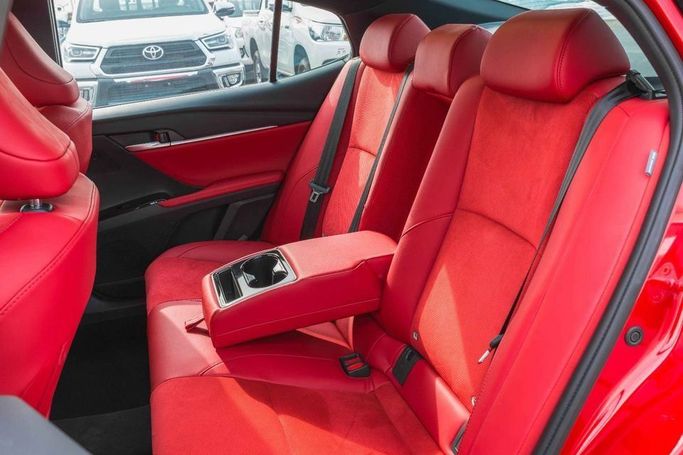 New Toyota Camry IX (XV80) China Market, 2.0 l, 2024 in Dubai by Albakheet Motors, Red color. Chinese Specs | AUTO.AE