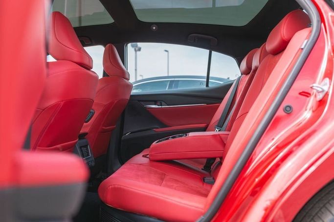 New Toyota Camry IX (XV80) China Market, 2.0 l, 2024 in Dubai by Albakheet Motors, Red color. Chinese Specs | AUTO.AE