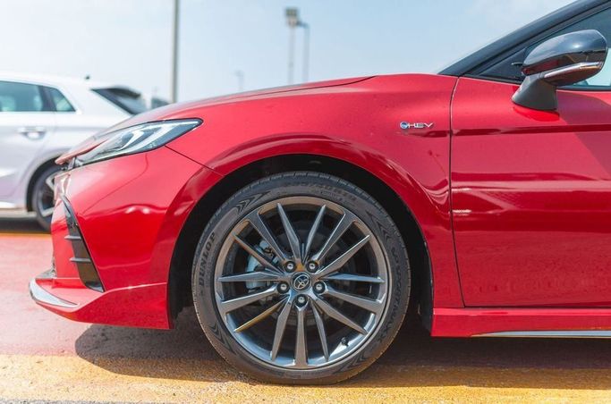 New Toyota Camry IX (XV80) China Market, 2.0 l, 2024 in Dubai by Albakheet Motors, Red color. Chinese Specs | AUTO.AE