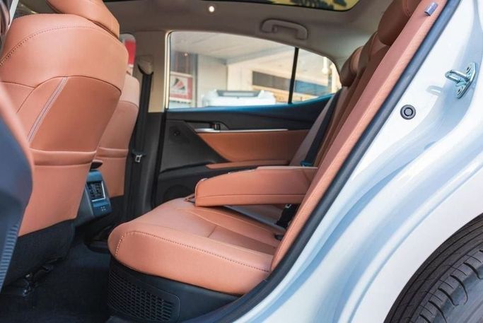 New Toyota Camry IX (XV80) China Market, 2.0 l, 2024 in Dubai by Albakheet Motors, White color. Chinese Specs | AUTO.AE