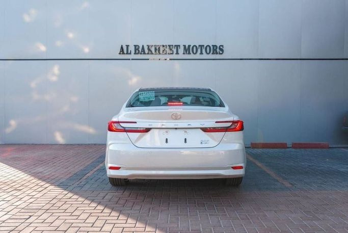New Toyota Camry IX (XV80) China Market, 2.0 l, 2024 in Dubai by Albakheet Motors, White color. Chinese Specs | AUTO.AE