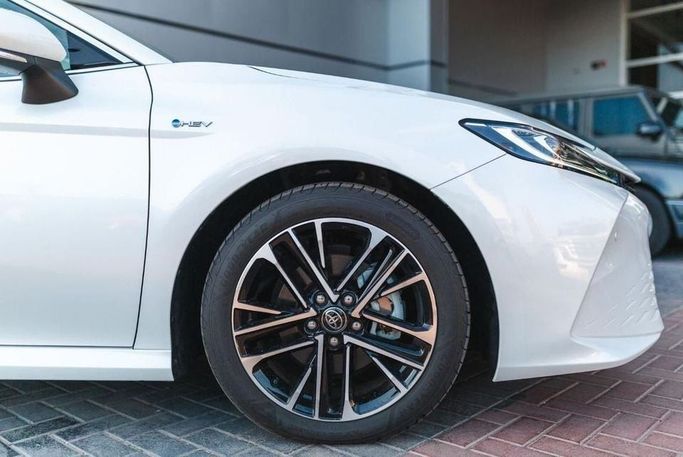 New Toyota Camry IX (XV80) China Market, 2.0 l, 2024 in Dubai by Albakheet Motors, White color. Chinese Specs | AUTO.AE