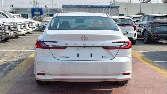 New Toyota Camry IX (XV80) China Market, 2.0 l, 2024 in Dubai by Albakheet Motors, White color. Chinese Specs | AUTO.AE