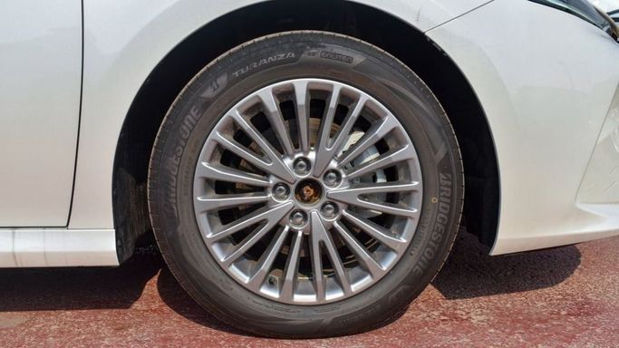 New Toyota Camry IX (XV80) China Market, 2.0 l, 2024 in Dubai by Albakheet Motors, White color. Chinese Specs | AUTO.AE