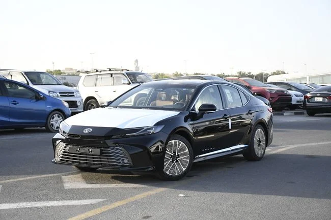 New Toyota Camry IX (XV80), 2.5 l, 2026 in Dubai by AL MADINA CARS FZE, Black color. GCC Specs | AUTO.AE